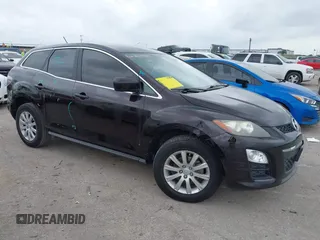 2012 Mazda CX-7 i Sport z VIN JM3ER2BM6C0411521, wystawiony jako IAAI lot #42146404 z przebiegiem 131 765 mil mil oraz . Historia ofert i sprzedaży dostępna na DreamBid. Obrazek 1.
