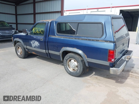1991 Dodge Dakota z VIN 1B7GG26X3MS259618, wystawiony jako IAAI lot #42316385 z przebiegiem 174 734 mil mil oraz . Historia ofert i sprzedaży dostępna na DreamBid. Obrazek 3.