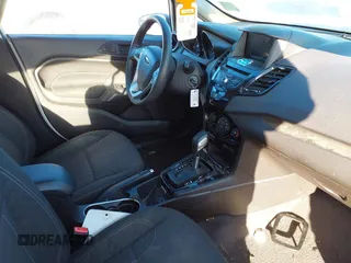 2019 Ford Fiesta SE z VIN 3FADP4EJ0KM148306, wystawiony jako IAAI lot #41666170 z przebiegiem 68 966 mil mil oraz . Historia ofert i sprzedaży dostępna na DreamBid. Obrazek 5.