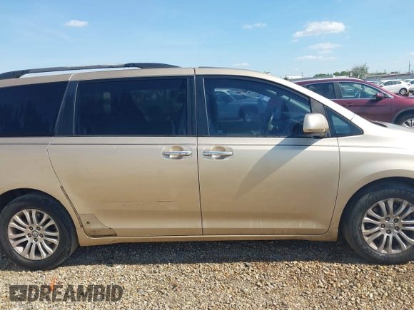 2011 Toyota Sienna XLE AAS with VIN 5TDYK3DC4BS013644, listed as a IAAI auction lot 41905759 with 208,800 mi miles and . Bid and sale history available at DreamBid. Image 13.