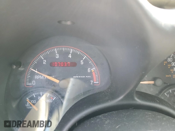 2004 Pontiac Grand Am SE1 with VIN 1G2NF52E74M568873, listed as a Copart auction lot 56187005 with 107,037 mi miles and Salvage title. Bid and sale history available at DreamBid. Image 9.