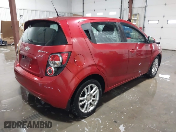 2013 Chevrolet Sonic LT with VIN 1G1JC6SH1D4116946, listed as a IAAI auction lot 41562425 with 116,815 mi miles. Bid and sale history available at carsss.com. Image 4.