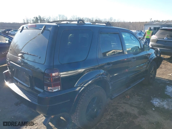 2002 Ford Escape Limited with VIN 1FMCU041X2KC74197, listed as a IAAI auction lot 41363369 with 153,704 mi miles. Bid and sale history available at carsss.com. Image 4.