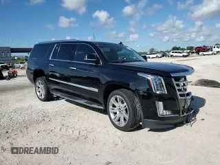 2020 Cadillac Escalade ESV Luxury z VIN 1GYS3HKJ7LR223781, wystawiony jako Copart lot #56966085 z przebiegiem 68 802 mil mil oraz Szkoda całkowita • Salvage title. Historia ofert i sprzedaży dostępna na DreamBid. Obrazek 14.
