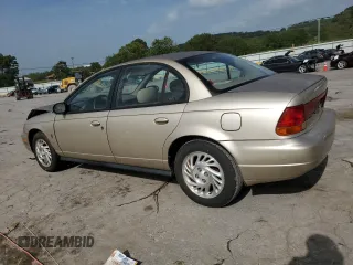 1998 Saturn SL with VIN 1G8ZK5270WZ240303, listed as a Copart auction lot 65364164 with 156,699 mi miles and Salvage title. Bid and sale history available at DreamBid. Image 2.