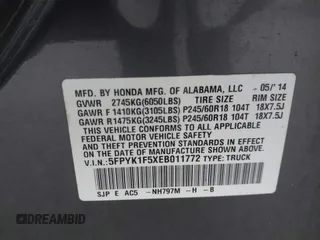 2014 Honda Ridgeline RTL with VIN 5FPYK1F5XEB011772, listed as a IAAI auction lot 42440390 with 145,219 mi miles and . Bid and sale history available at DreamBid. Image 9.