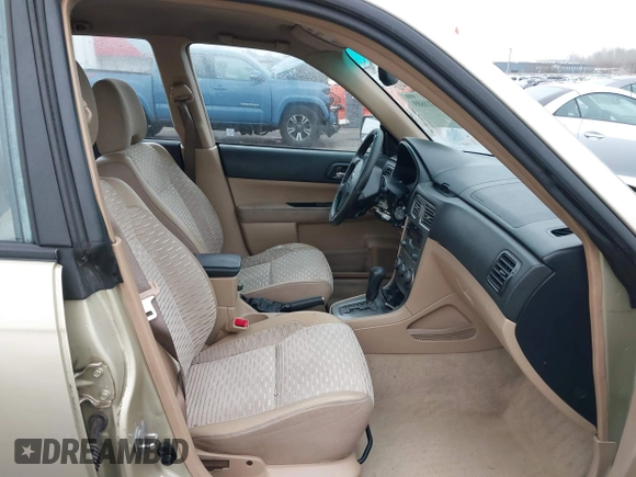 2003 Subaru Forester XS with VIN JF1SG65663H753306, listed as a IAAI auction lot 41311689 with 253,269 mi miles. Bid and sale history available at carsss.com. Image 5.