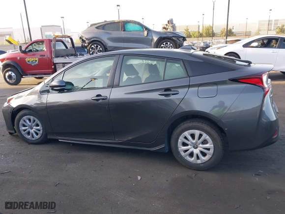2020 Toyota Prius L Eco with VIN JTDKARFU9L3122010, listed as a IAAI auction lot 41969655 with 76,250 mi miles. Bid and sale history available at carsss.com. Image 14.