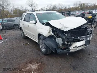 2014 GMC Acadia Denali with VIN 1GKKVTKD2EJ271871, listed as a IAAI auction lot 41699704 with 177,496 mi miles. Bid and sale history available at carsss.com. Image 1.