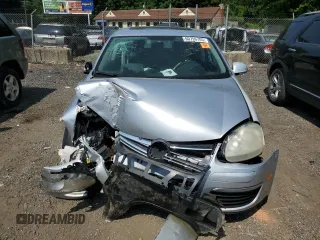 2007 Volkswagen Jetta Wolfsburg Edition z VIN 3VWEF71K07M168433, wystawiony jako Copart lot #60796705 z przebiegiem Nie podano mil oraz Szkoda całkowita • Salvage title. Historia ofert i sprzedaży dostępna na DreamBid. Obrazek 5.