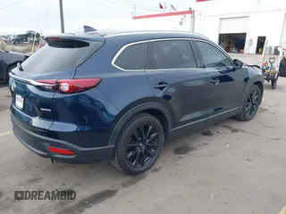 2022 Mazda CX-9 Touring Plus with VIN JM3TCBAY6N0616918, listed as a IAAI auction lot 41242341 with 22,384 mi miles and . Bid and sale history available at carsss.com. Image 4.