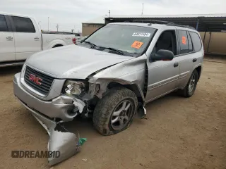 2005 GMC Envoy SLT with VIN 1GKDT13S152124404, listed as a Copart auction lot 64011494 with 212,951 mi miles and Salvage Title. Bid and sale history available at DreamBid. Image 1.
