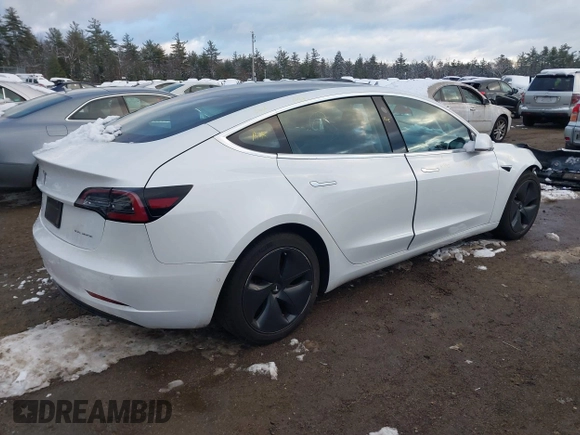 2020 Tesla Model 3 Long Range with VIN 5YJ3E1EB6LF784169, listed as a IAAI auction lot 40957226 with 96,415 mi miles. Bid and sale history available at carsss.com. Image 4.