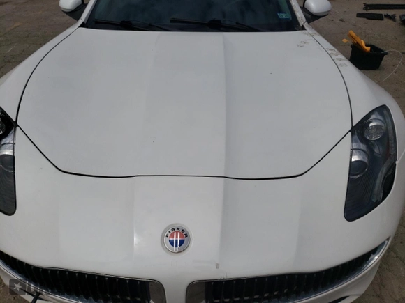 2012 Fisker Karma EcoSport z VIN YH4K14AA4CA001399, wystawiony jako Copart lot #58795325 z przebiegiem Nie podano mil oraz Czysty tytuł • Clean title. Historia ofert i sprzedaży dostępna na DreamBid. Obrazek 11.