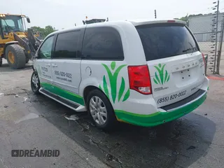 2014 Dodge Grand Caravan American Value with VIN 2C4RDGBG6ER380568, listed as a IAAI auction lot 41683180 with 303,612 mi miles and . Bid and sale history available at DreamBid. Image 3.
