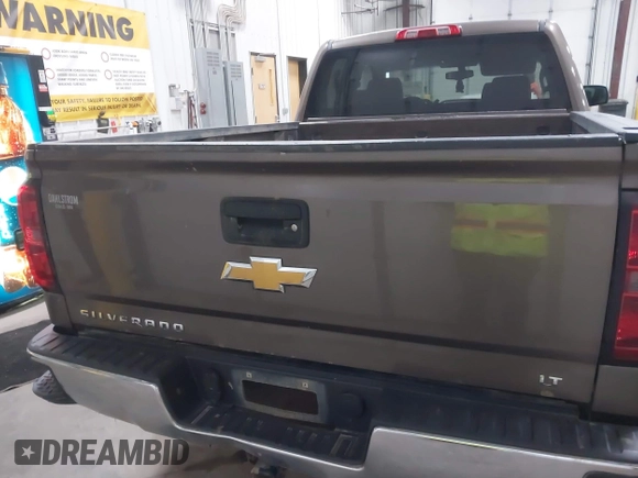 2014 Chevrolet Silverado 1500 LT with VIN 1GCVKREC9EZ240612, listed as a IAAI auction lot 41108566 with 200,625 mi miles and . Bid and sale history available at DreamBid. Image 17.