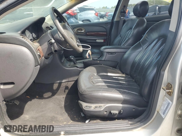 2000 Chrysler 300M M with VIN 2C3HE66G9YH383296, listed as a Copart auction lot 52339395 with 128,842 mi miles and Salvage Title. Bid and sale history available at DreamBid. Image 7.