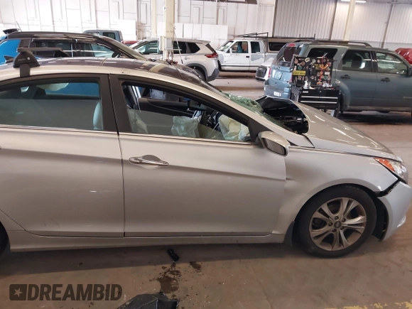 2012 Hyundai Sonata Limited z VIN 5NPEC4AC6CH361933, wystawiony jako IAAI lot #42004586 z przebiegiem 88 500 mil mil oraz . Historia ofert i sprzedaży dostępna na DreamBid. Obrazek 13.