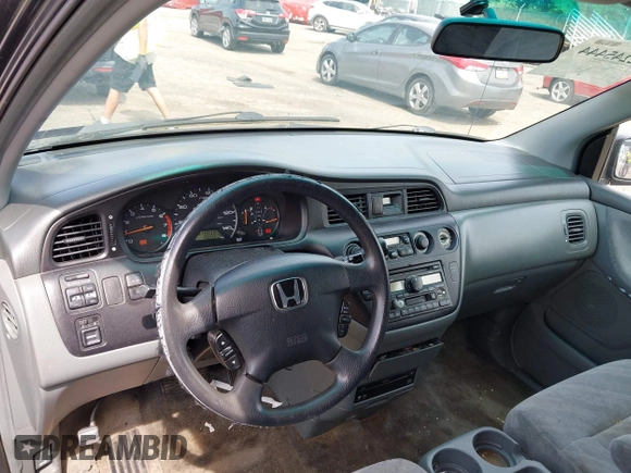 2004 Honda Odyssey EX-RES z VIN 5FNRL18824B138287, wystawiony jako IAAI lot #42245444 z przebiegiem 196 932 mil mil oraz . Historia ofert i sprzedaży dostępna na DreamBid. Obrazek 14.