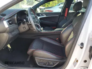 2023 Genesis G70 3.3T with VIN KMTG54TE3PU113251, listed as a Copart auction lot 52675895 with 20,969 mi miles and Salvage title. Bid and sale history available at DreamBid. Image 7.