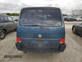 1993 Volkswagen EuroVan с VIN WV2MC0707PH010911, выставлен на аукционе Copart как лот 78414594 с пробегом 191 174 миль миль и Чистый • Clean title. История ставок и продаж доступна на DreamBid. Изображение 6.