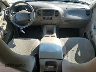 2001 Ford Expedition XLT z VIN 1FMRU15W51LB78285, wystawiony jako Copart lot #54914745 z przebiegiem Nie podano mil oraz Szkody całkowita. Historia ofert i sprzedaży dostępna na DreamBid. Obrazek 8.