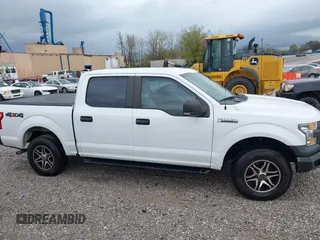 2016 Ford F-150 XLT with VIN 1FTEW1E84GKE18228, listed as a IAAI auction lot 41883297 with 147,018 mi miles. Bid and sale history available at carsss.com. Image 13.