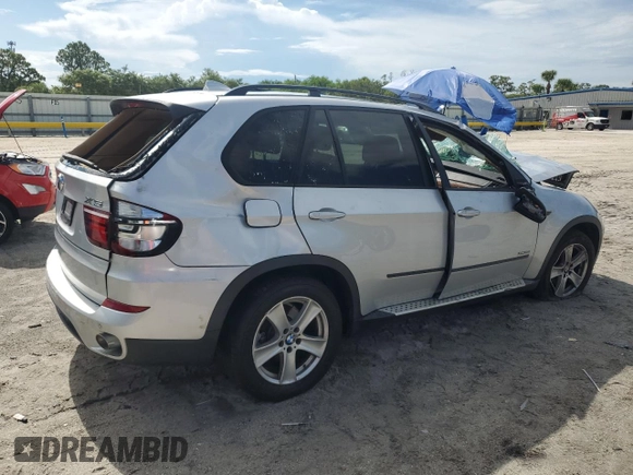 2012 BMW X5 35d with VIN 5UXZW0C51CL668064, listed as a Copart auction lot 62217845 with 140,544 mi miles and Salvage title. Bid and sale history available at DreamBid. Image 3.