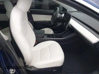 2020 Tesla Model 3 Standard Range Plus with VIN 5YJ3E1EA1LF802648, listed as a IAAI auction lot 42208034 with 27,231 mi miles and . Bid and sale history available at DreamBid. Image 5.