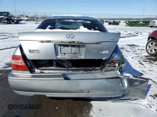 1999 Infiniti Q45 z VIN JNKBY31A2XM602927, wystawiony jako Copart lot #45627825 z przebiegiem 174 080 mil mil oraz Szkody całkowita. Historia ofert i sprzedaży dostępna na DreamBid. Obrazek 6.