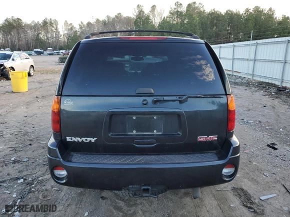 2004 GMC Envoy SLE with VIN 1GKDT13SX42397257, listed as a Copart auction lot 43580615 with 189,759 mi miles and Salvage Title. Bid and sale history available at carsss.com. Image 6.