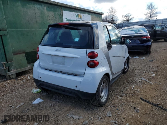 2015 Smart fortwo Passion z VIN WMEEJ3BA8FK790317, wystawiony jako Copart lot #71124392 z przebiegiem Nie podano mil oraz Szkody całkowita. Historia ofert i sprzedaży dostępna na DreamBid. Obrazek 3.
