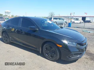 2021 Honda Civic LX z VIN 2HGFC2F60MH518797, wystawiony jako IAAI lot #42146034 z przebiegiem 33 613 mil mil oraz . Historia ofert i sprzedaży dostępna na DreamBid. Obrazek 1.