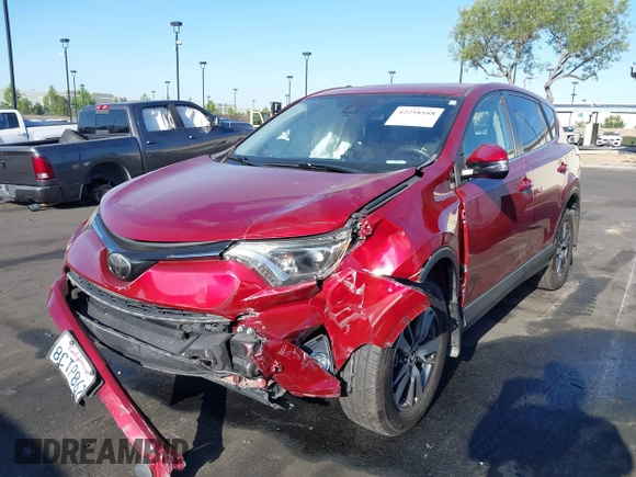 2018 Toyota RAV4 XLE with VIN JTMWFREV6JD117500, listed as a IAAI auction lot 42258588 with Not provided miles and . Bid and sale history available at DreamBid. Image 6.