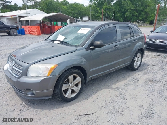 2012 Dodge Caliber SXT with VIN 1C3CDWDA6CD510605, listed as a IAAI auction lot 42104688 with 221,059 mi miles. Bid and sale history available at carsss.com. Image 2.
