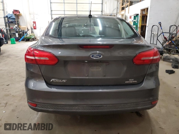 2016 Ford Focus SE z VIN 1FADP3F20GL305441, wystawiony jako Copart lot #55445105 z przebiegiem 117 033 mil mil oraz Szkoda całkowita • Salvage title. Historia ofert i sprzedaży dostępna na DreamBid. Obrazek 6.