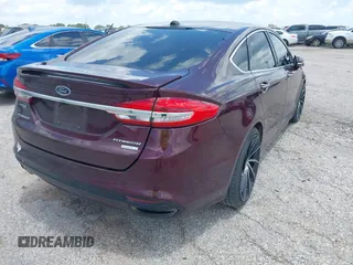 2018 Ford Fusion Titanium with VIN 3FA6P0K92JR114283, listed as a IAAI auction lot 42704476 with 92,502 mi miles and . Bid and sale history available at DreamBid. Image 4.
