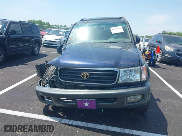 2000 Toyota Land Cruiser with VIN JT3HT05J8Y0123024, listed as a IAAI auction lot 42028792 with 360,074 mi miles. Bid and sale history available at carsss.com. Image 12.