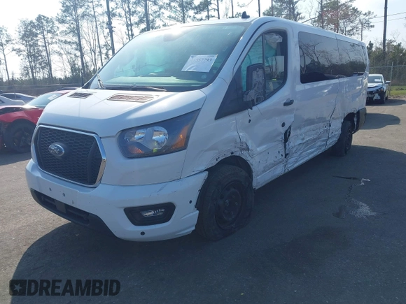 2024 Ford Transit Passenger XL z VIN 1FBAX2YGXRKA28228, wystawiony jako IAAI lot #41557793 z przebiegiem 32 264 mil mil oraz . Historia ofert i sprzedaży dostępna na DreamBid. Obrazek 2.