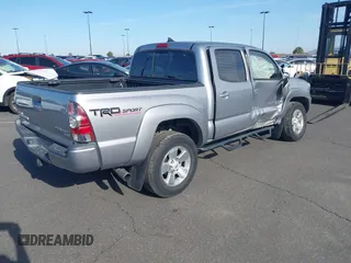2014 Toyota Tacoma PreRunner with VIN 5TFJU4GN3EX051198, listed as a IAAI auction lot 41764088 with 126,259 mi miles. Bid and sale history available at carsss.com. Image 4.