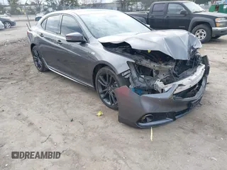 2019 Acura TLX w/A-Spec Pkg z VIN 19UUB2F61KA004284, wystawiony jako IAAI lot #41241123 z przebiegiem 95 564 mil mil oraz . Historia ofert i sprzedaży dostępna na DreamBid. Obrazek 1.