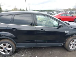 2015 Ford Escape SE with VIN 1FMCU0GX4FUC32490, listed as a IAAI auction lot 41988346 with 113,864 mi miles and . Bid and sale history available at DreamBid. Image 14.