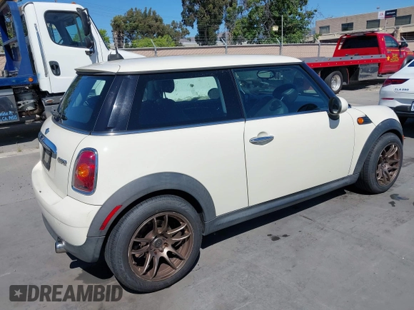 2010 MINI Hardtop with VIN WMWMF3C51ATZ62765, listed as a IAAI auction lot 42314250 with 168,345 mi miles and . Bid and sale history available at DreamBid. Image 4.