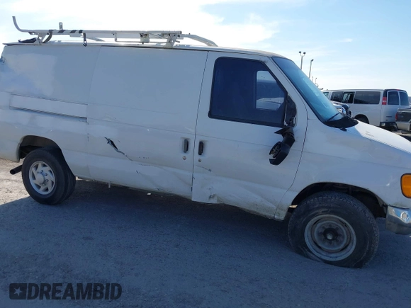 2006 Ford Econoline Cargo with VIN 1FTSE34L66HB03093, listed as a IAAI auction lot 41197550 with 310,863 mi miles. Bid and sale history available at carsss.com. Image 6.
