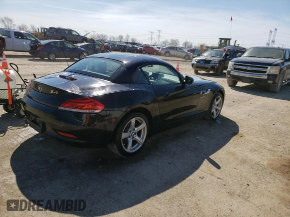 2015 BMW Z4 sDrive28i with VIN WBALL5C55FP557752, listed as a Copart auction lot 47733293 with 48,882 mi miles. Bid and sale history available at carsss.com. Image 3.