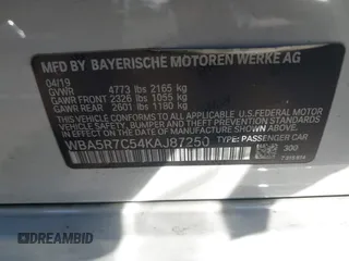 2019 BMW 3 Series 330i xDrive with VIN WBA5R7C54KAJ87250, listed as a IAAI auction lot 40857709 with 81,796 mi miles. Bid and sale history available at carsss.com. Image 9.