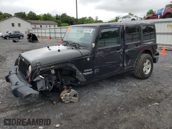 2012 Jeep Wrangler Unlimited Sport z VIN 1C4BJWDG9CL102626, wystawiony jako Copart lot #58421455 z przebiegiem 128 421 mil mil oraz Szkoda całkowita • Salvage title. Historia ofert i sprzedaży dostępna na DreamBid. Obrazek 1.