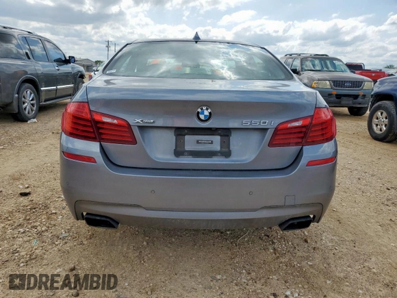2016 BMW 5 Series 550i xDrive with VIN WBAKP9C51GD981293, listed as a Copart auction lot 60735095 with Not provided miles and Salvage title. Bid and sale history available at DreamBid. Image 6.