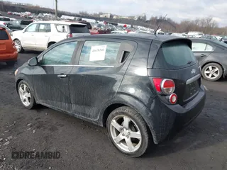 2012 Chevrolet Sonic LTZ z VIN 1G1JE6SH2C4114048, wystawiony jako IAAI lot #41678246 z przebiegiem 138 863 mil mil oraz . Historia ofert i sprzedaży dostępna na DreamBid. Obrazek 3.