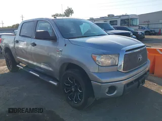 2012 Toyota Tundra with VIN 5TFEY5F14CX117894, listed as a IAAI auction lot 40537406 with 186,925 mi miles and . Bid and sale history available at DreamBid. Image 1.